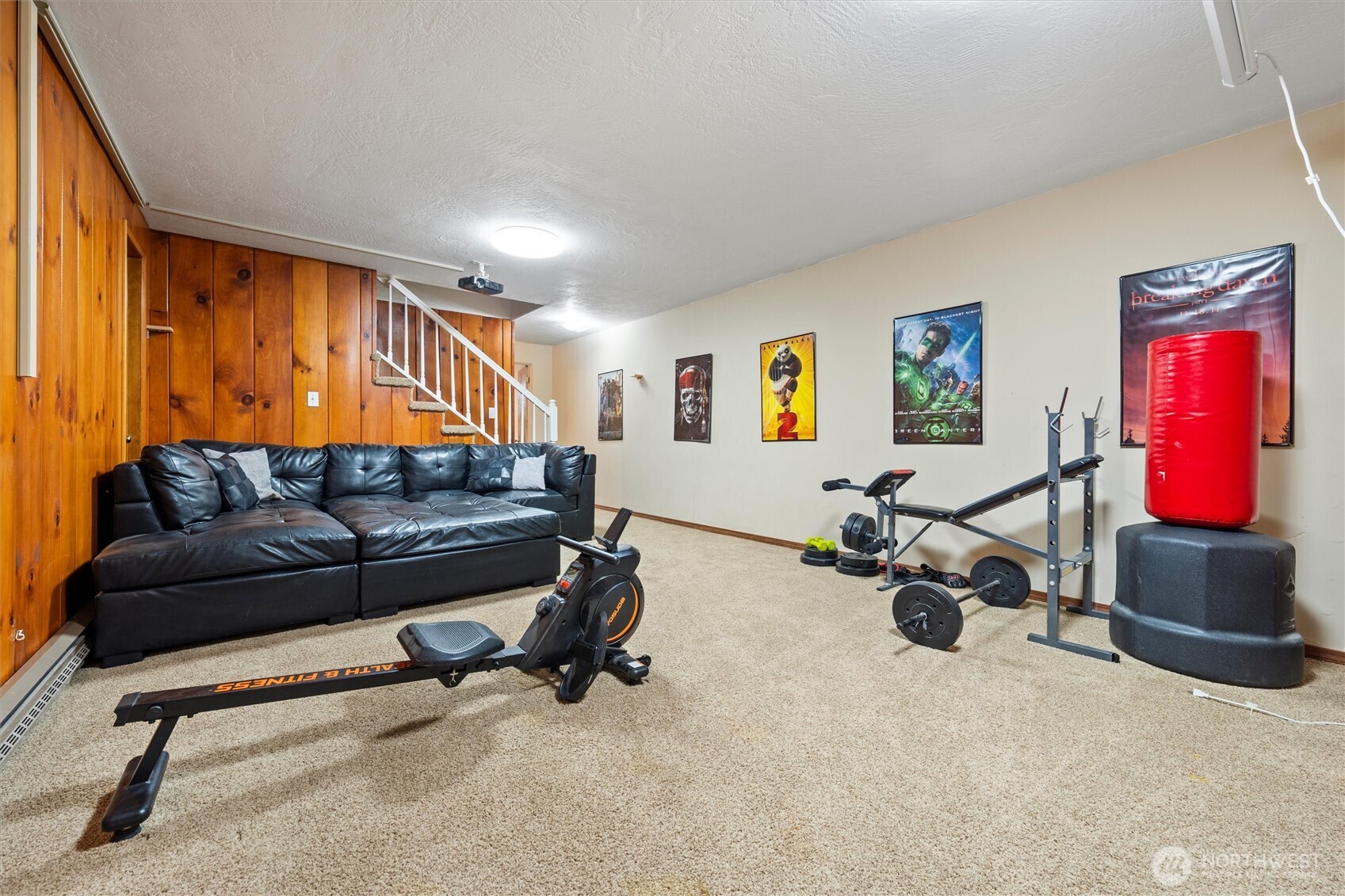 1162 D Street Southwest Ephrata, WA 98823 - Photo 30 of 37 a living room with furniture gym equipment and a window