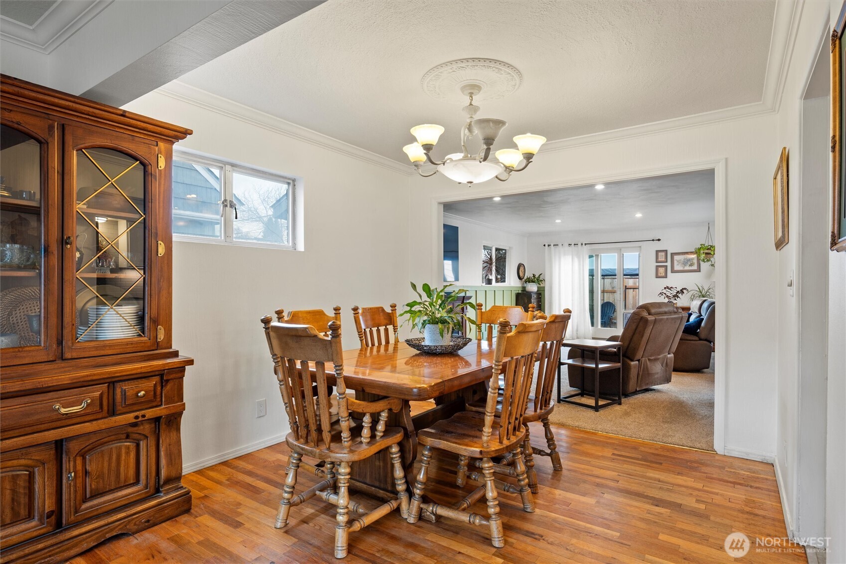 1162 D Street Southwest Ephrata, WA 98823 - Photo 5 of 37 a view of a dining room with furniture wooden floor and chandelier