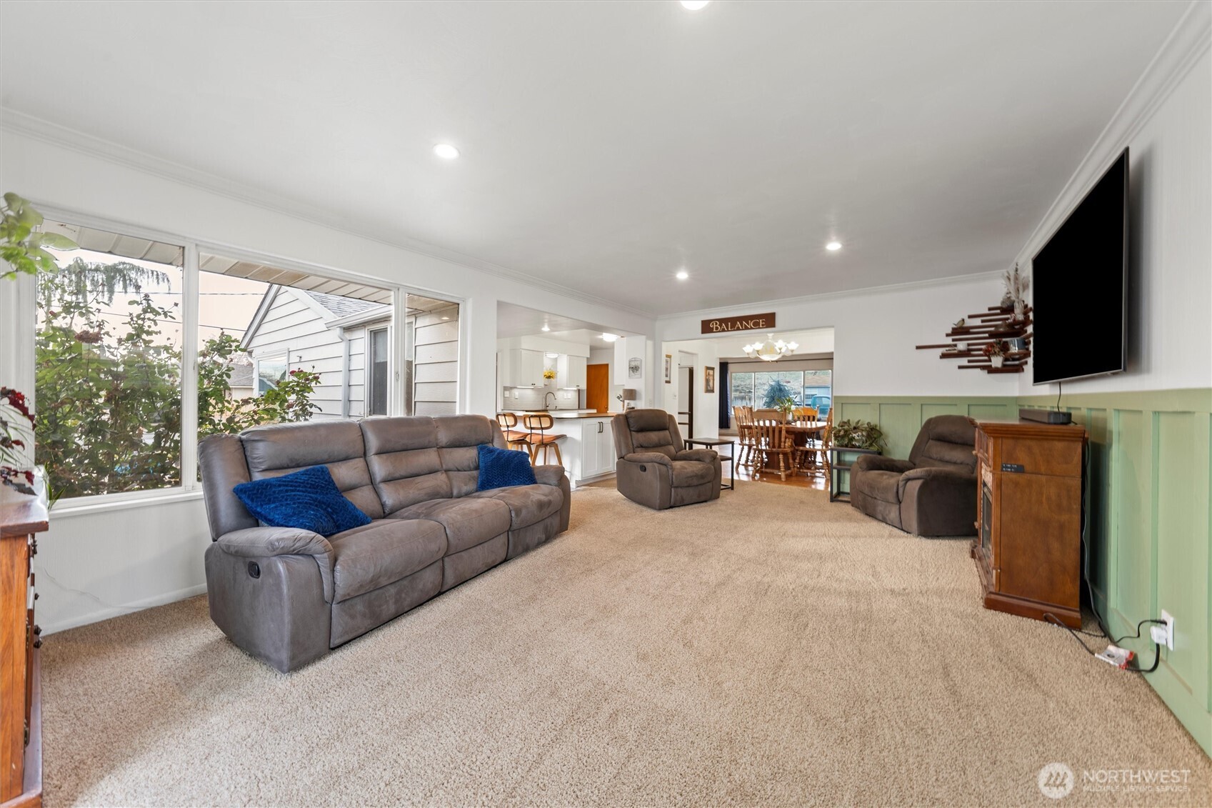1162 D Street Southwest Ephrata, WA 98823 - Photo 8 of 37 a living room with furniture a flat screen tv and a fireplace