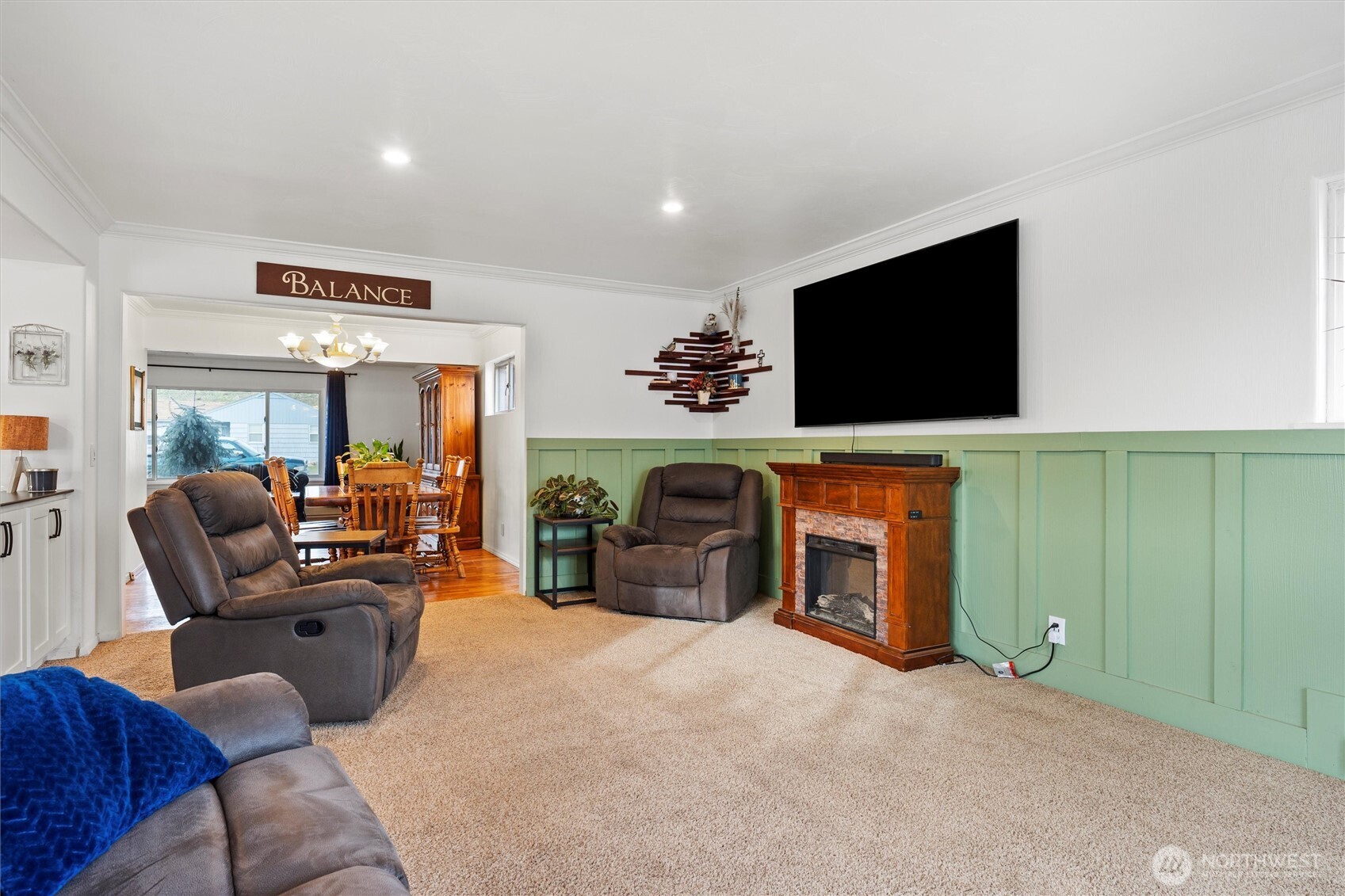 1162 D Street Southwest Ephrata, WA 98823 - Photo 9 of 37 a living room with furniture and a flat screen tv