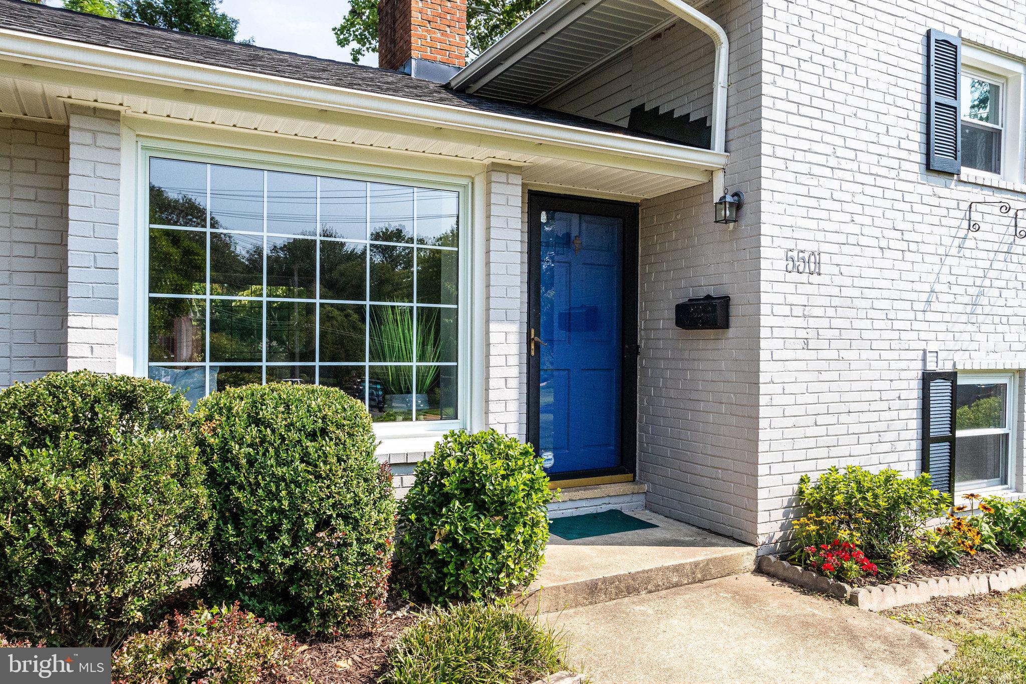 5501 Gardner Place Springfield, VA 22151 - Photo 4 of 35 Awesome blue door to compliment the grey brick.