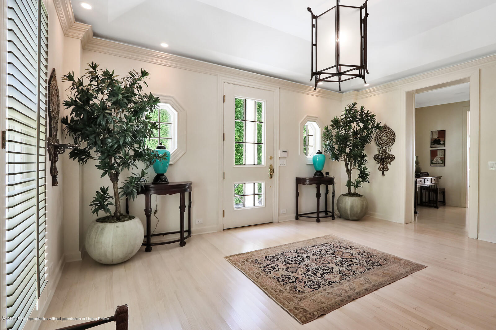 241 El Vedado Road Palm Beach, FL 33480 - Photo 3 of 31 a living room with furniture and a potted plant