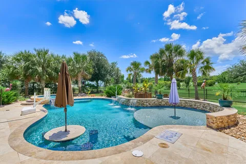 a view of a playground with basketball court
