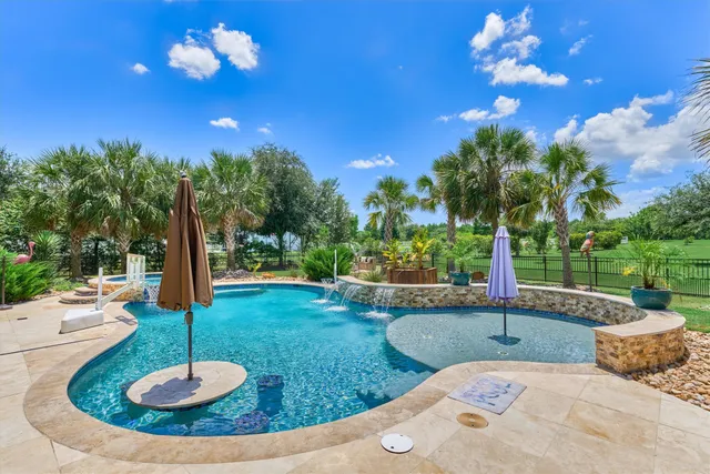 a view of a playground with basketball court