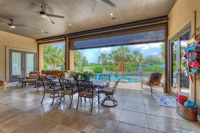a kitchen with a stove a sink and a microwave