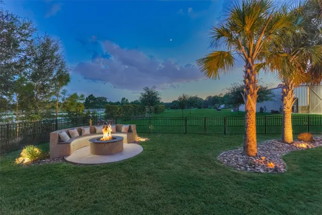 a view of a yard with patio