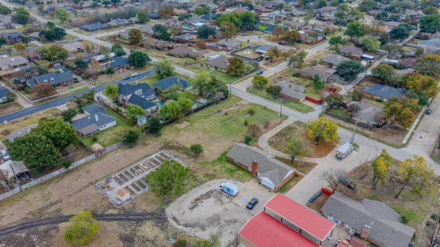 an aerial view of residential house with outdoor space
