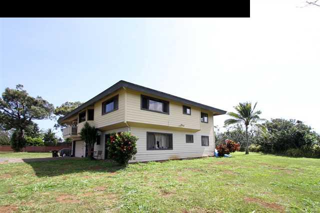 141 West Kuiaha Road Haiku, HI 96708 - Photo 11 of 15 a front view of a house with a yard