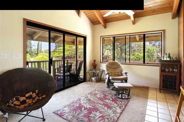 141 West Kuiaha Road Haiku, HI 96708 - Photo 3 of 15 a living room with furniture and a large window