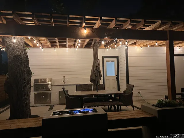 a view of balcony with wooden floor