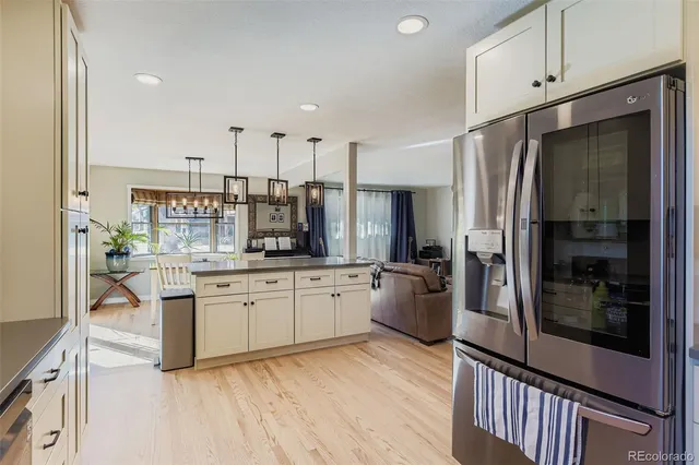a kitchen with counter top space and stainless steel appliances