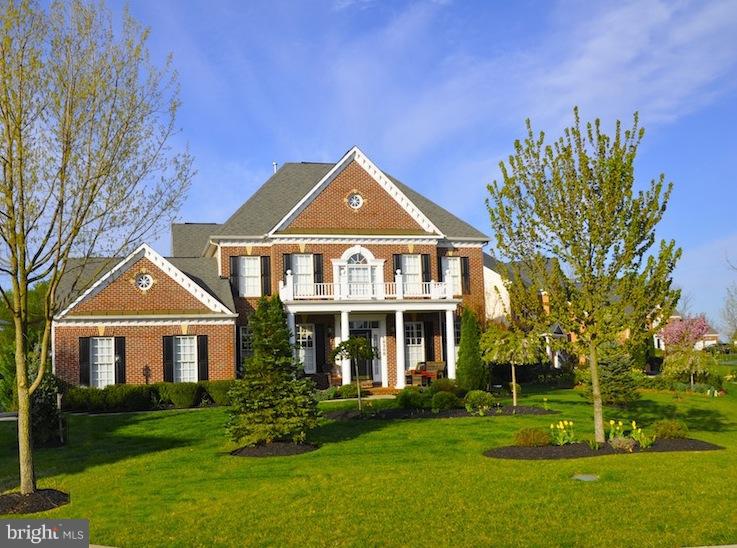 18308 Crestmount Road Boyds, MD 20841 - Photo 1 of 24 a front view of a house with a yard