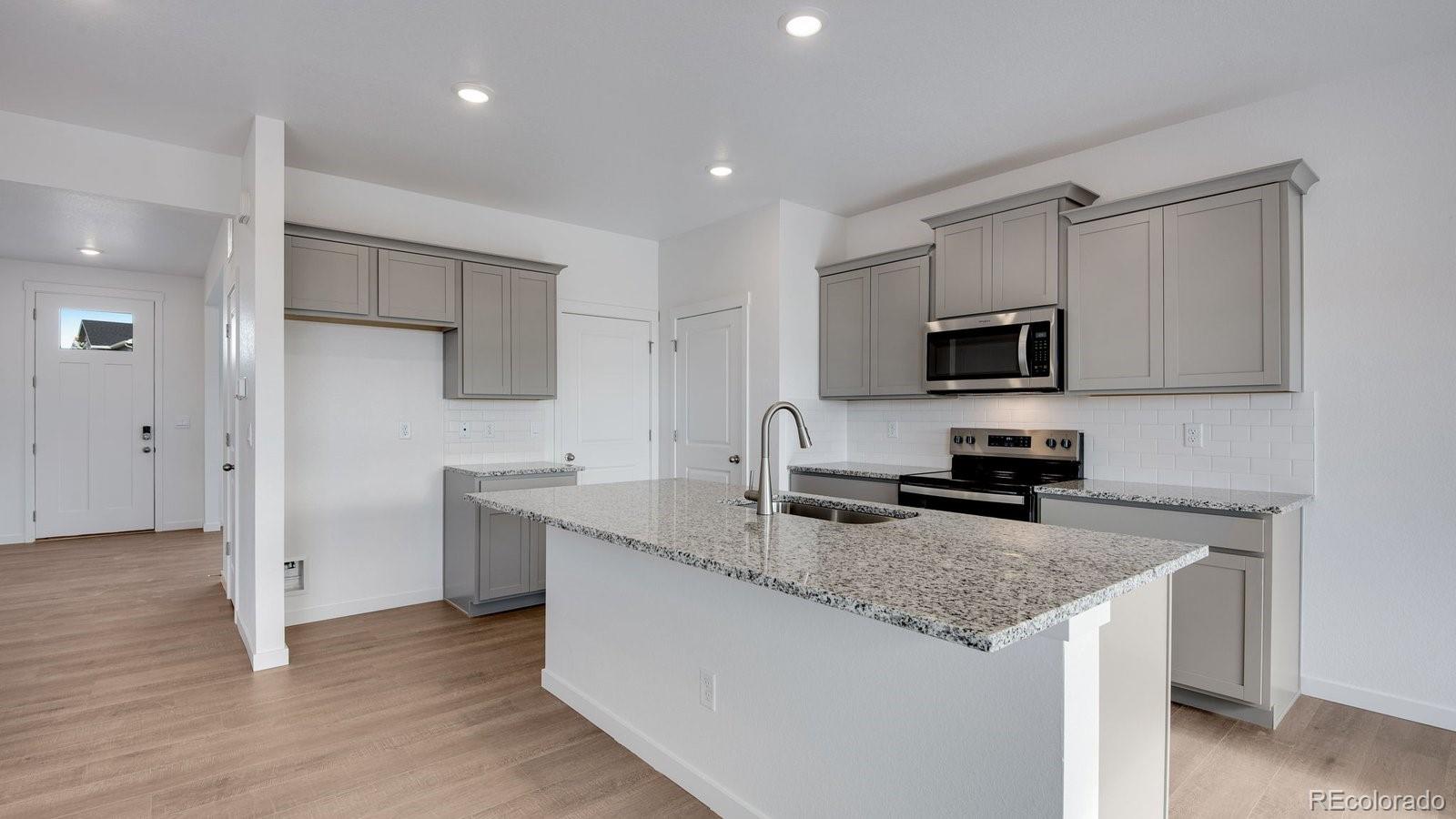 9855 Ceylon Court Commerce City, CO 80022 - Photo 7 of 50