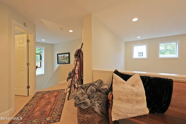 a view of a living room and bathroom