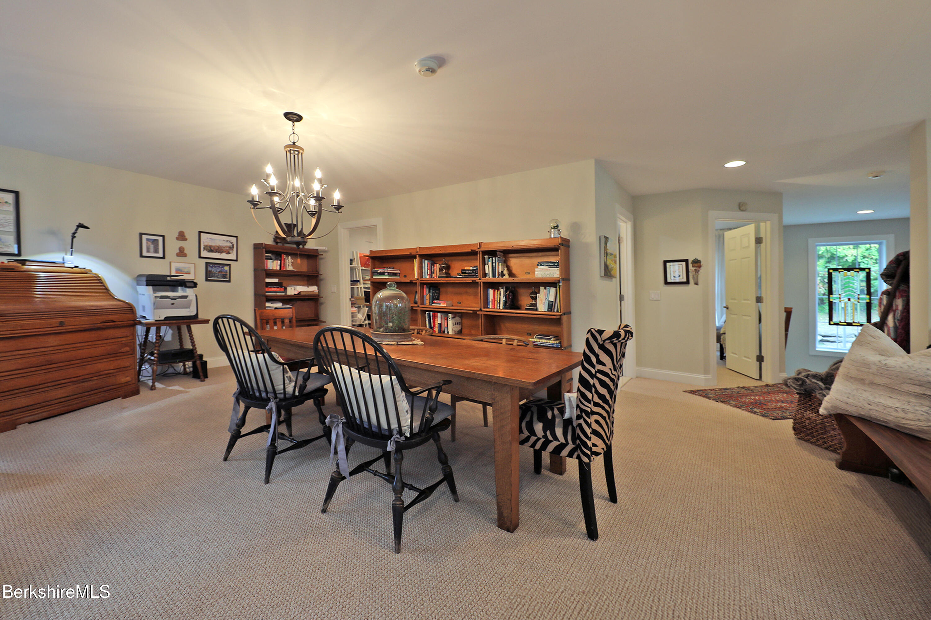 103 Alpine Trail Pittsfield, MA 01201 - Photo 29 of 39 a view of a dining room with furniture and chandelier