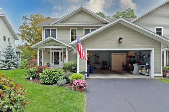 a front view of a house with a porch