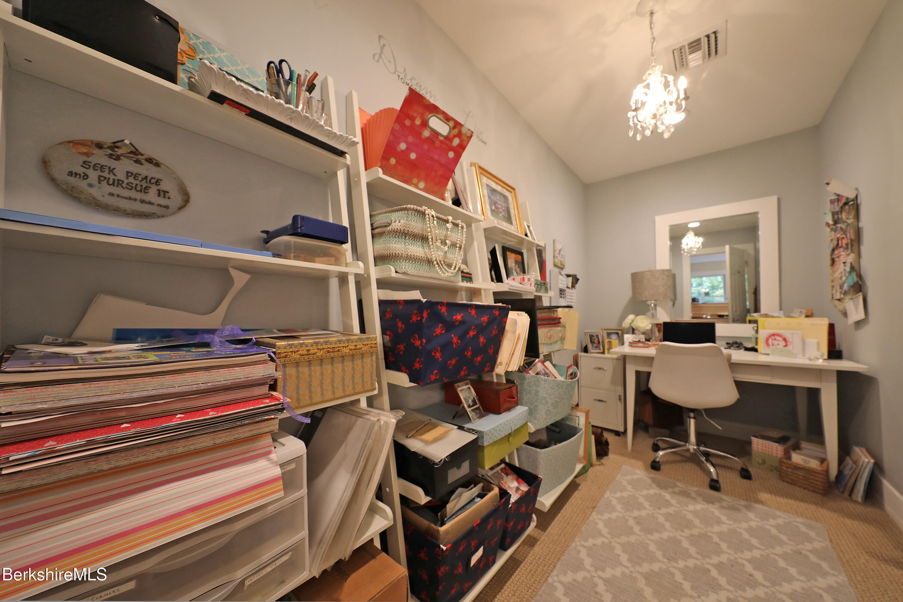 103 Alpine Trail Pittsfield, MA 01201 - Photo 32 of 39 a living room with furniture a dining table and chairs with wooden floor