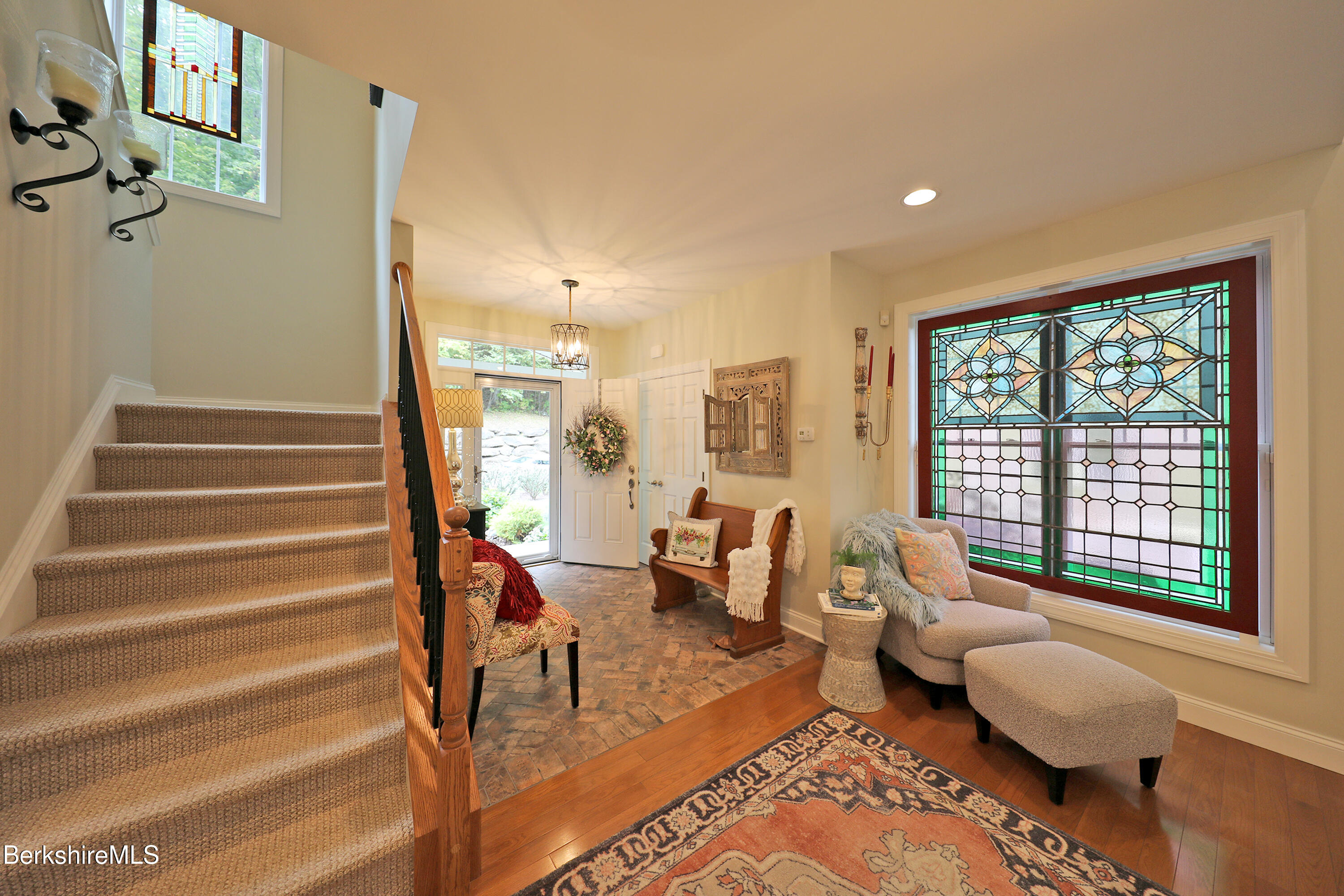 103 Alpine Trail Pittsfield, MA 01201 - Photo 7 of 39 a living room with furniture and floor to ceiling windows