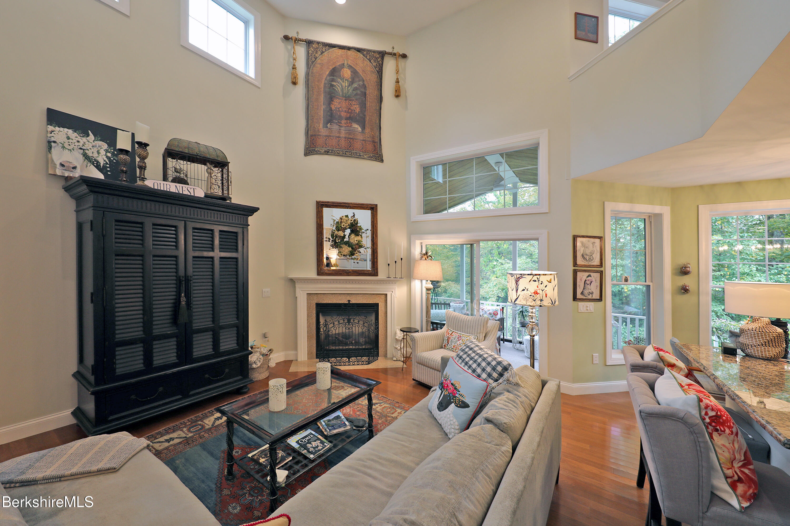 103 Alpine Trail Pittsfield, MA 01201 - Photo 8 of 39 a living room with furniture a flat screen tv and a fireplace