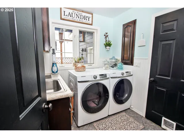 a utility room with dryer and washer