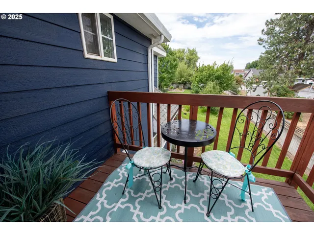 a view of a chairs in a balcony