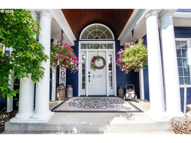 a front view of a house with yard
