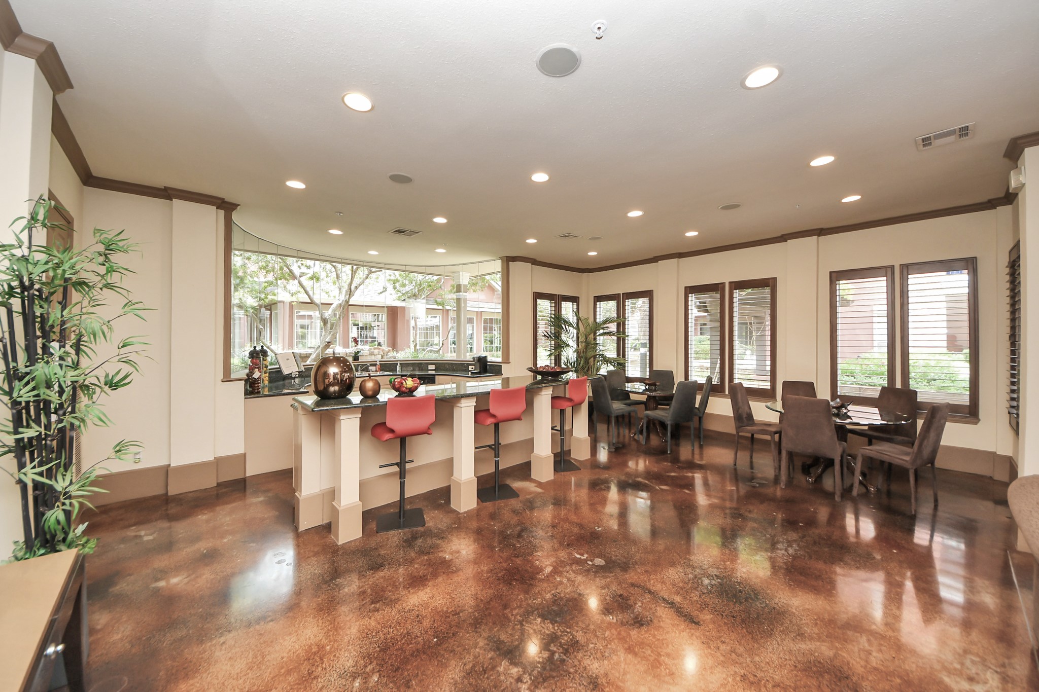2400 McCue Road, Unit 424 Houston, TX 77056 - Photo 24 of 33 a living room with lots of furniture and potted plants