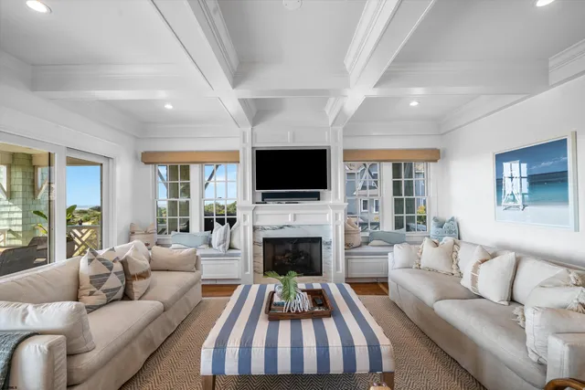 a large kitchen with a table and chairs