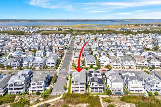 a view of an ocean and a mountain