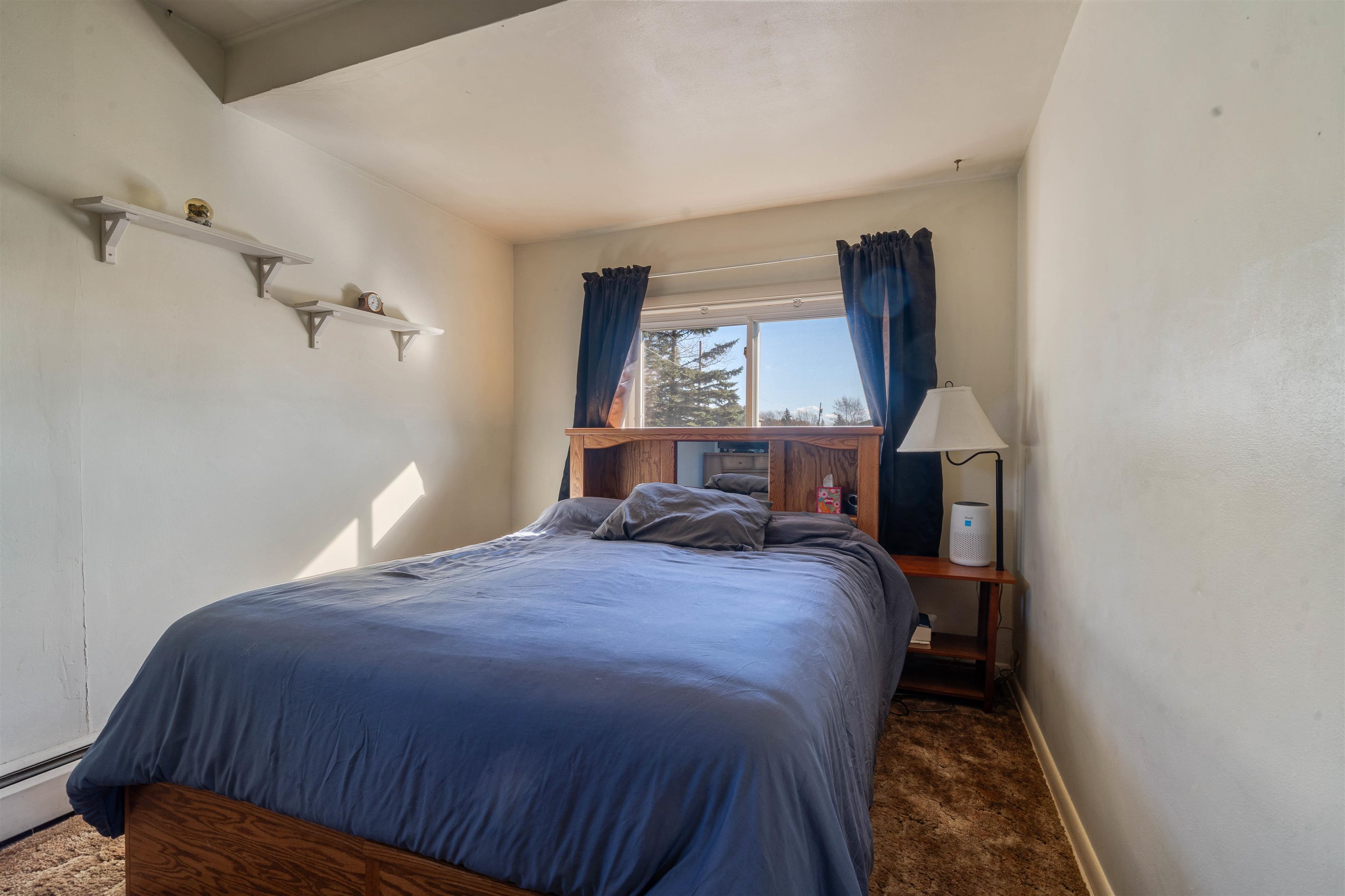 611 12th Avenue East Superior, WI 54880 - Photo 13 of 20 Bedroom featuring carpet floors and a baseboard radiator