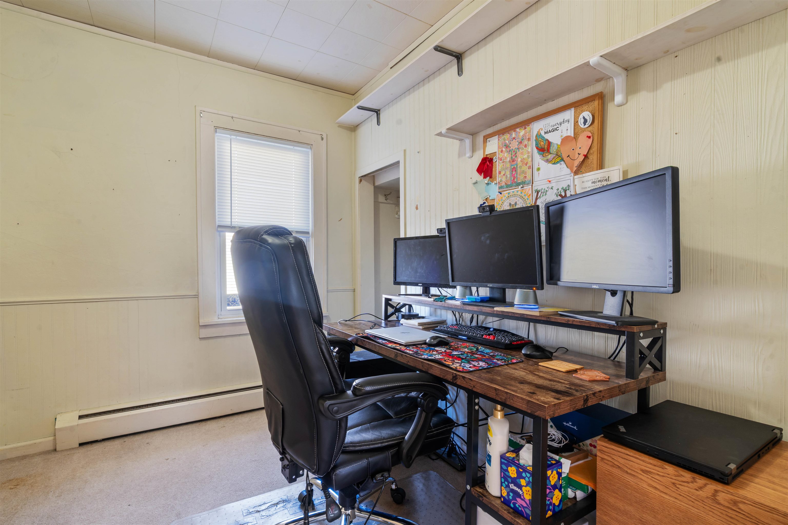 611 12th Avenue East Superior, WI 54880 - Photo 14 of 20 Home office with a baseboard radiator, wood walls, and wainscoting
