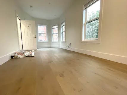 an empty room with windows