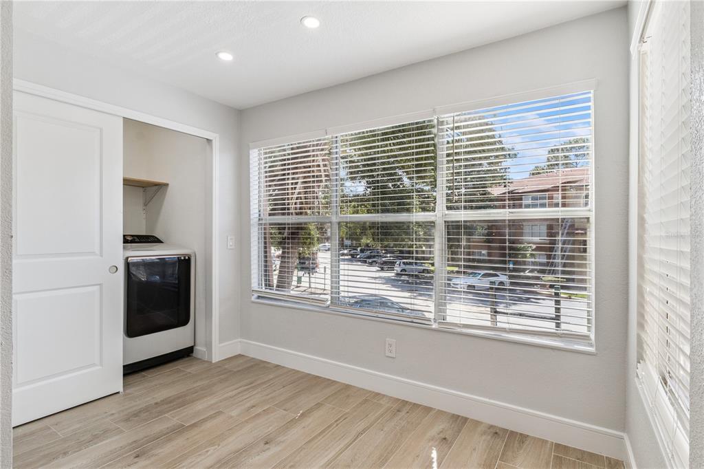 5124 Conroy Road, Unit 24 Orlando, FL 32811 - Photo 13 of 26 a view of a kitchen with a large window