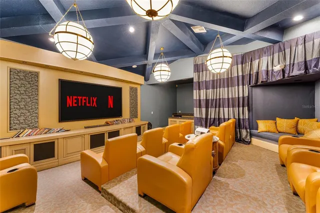 a view of a swimming pool with a lounge chair