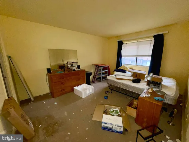 a room with furniture and a window