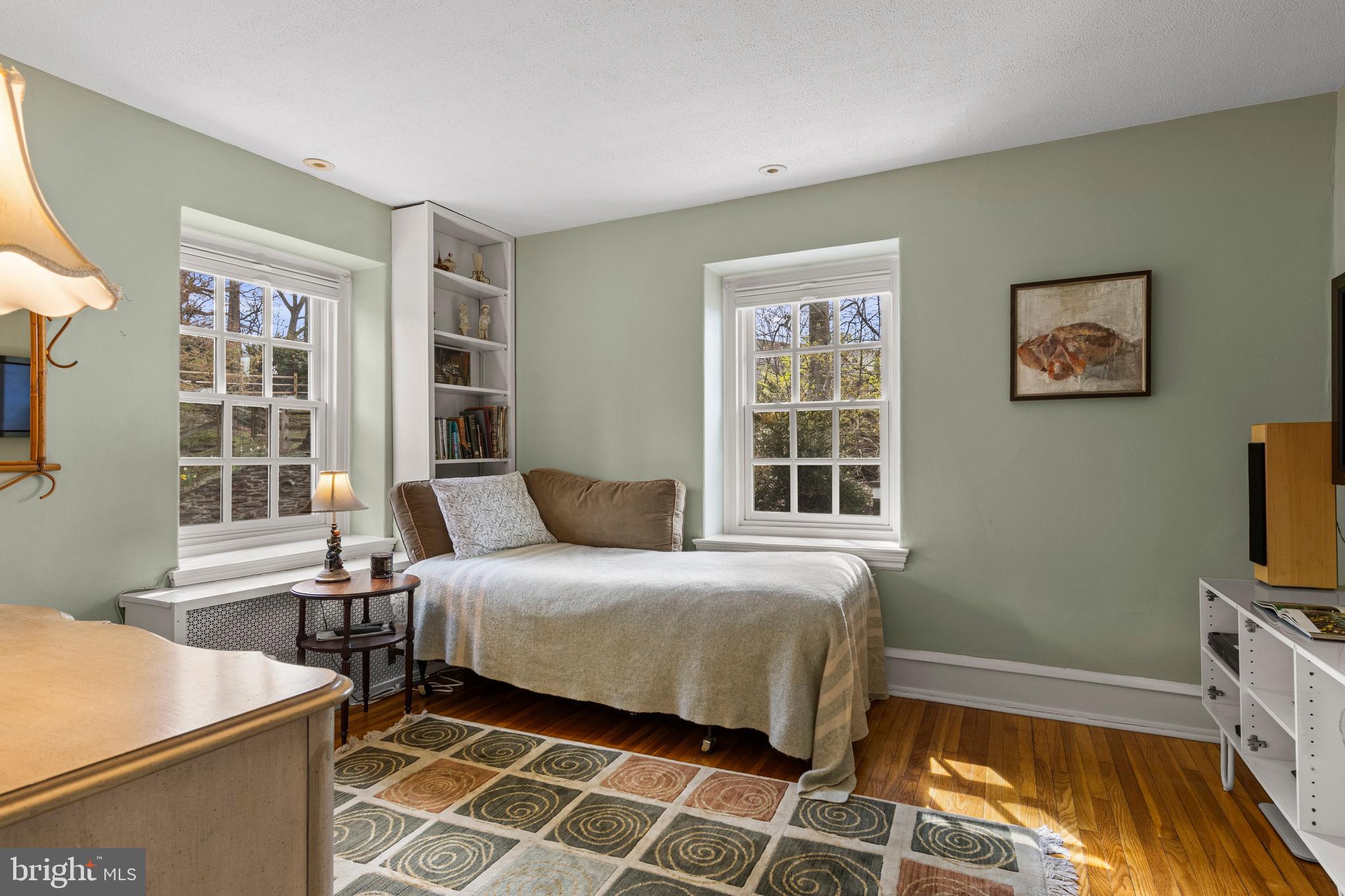 510 Anthwyn Road Merion Station, PA 19066 - Photo 19 of 30 a bedroom with a bed and a flat tv screen on dresser
