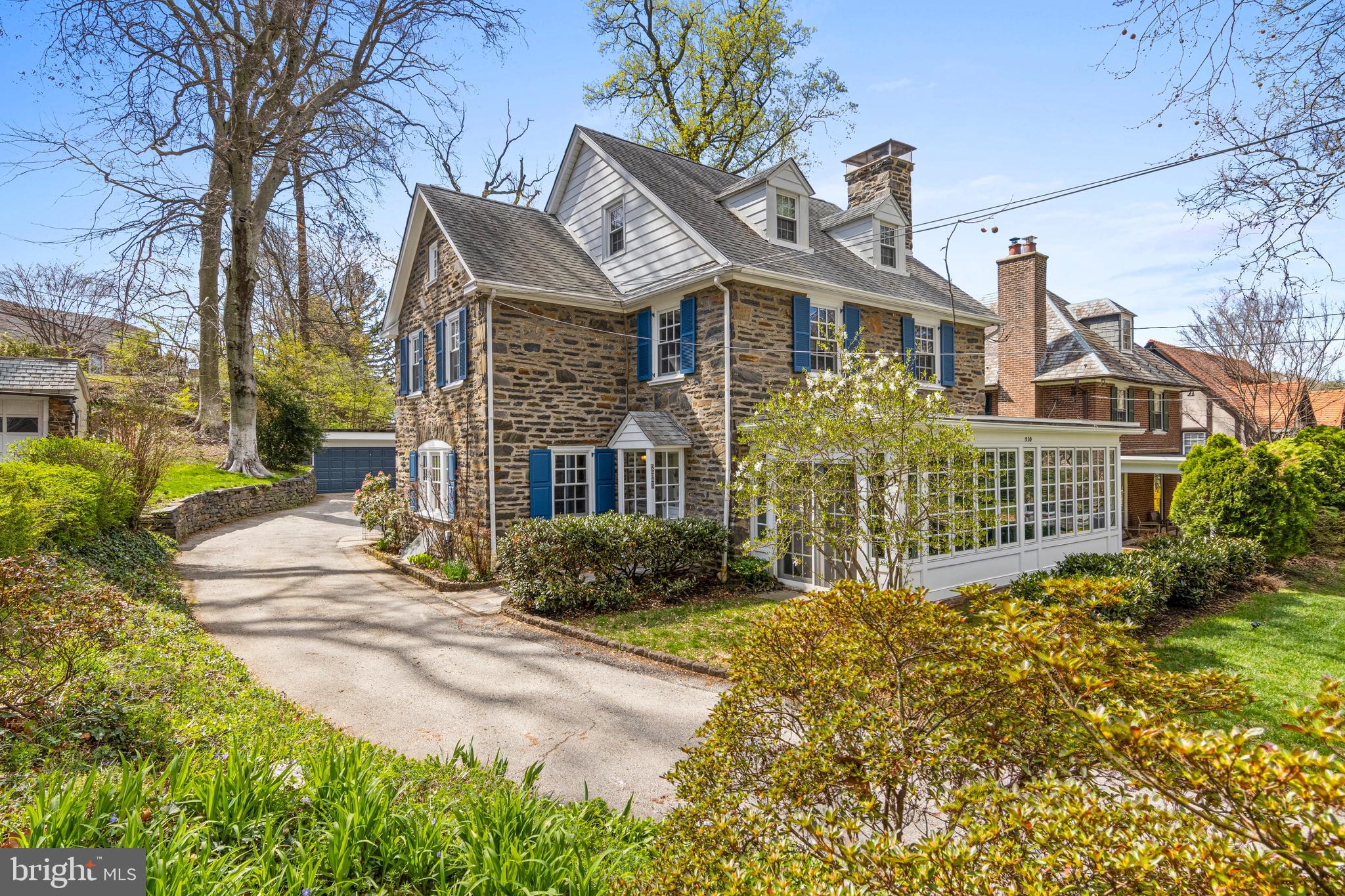 510 Anthwyn Road Merion Station, PA 19066 - Photo 2 of 30 a front view of house with yard and trees around