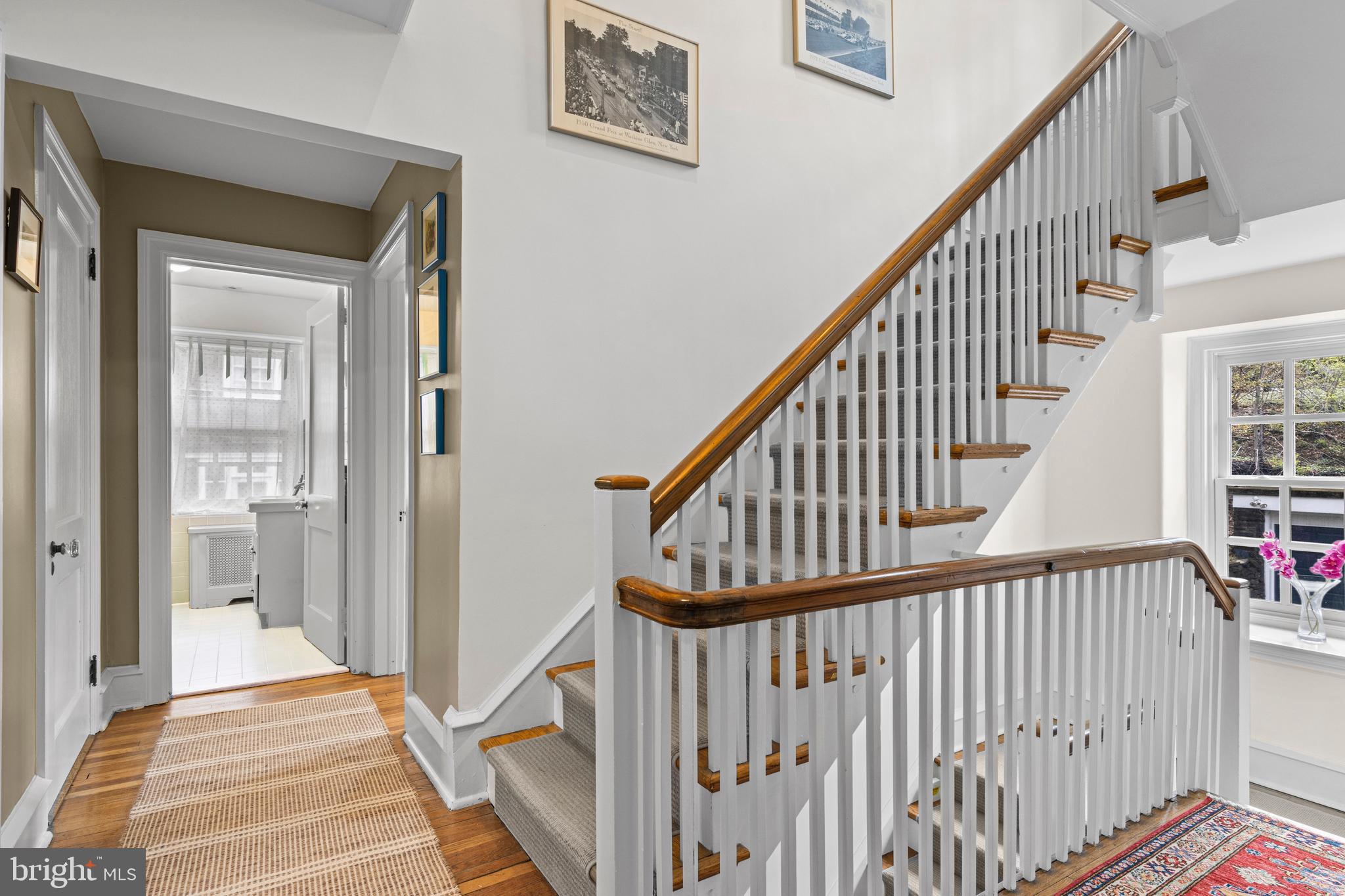 510 Anthwyn Road Merion Station, PA 19066 - Photo 21 of 30 a view of staircase with lots of frames on wall and a window