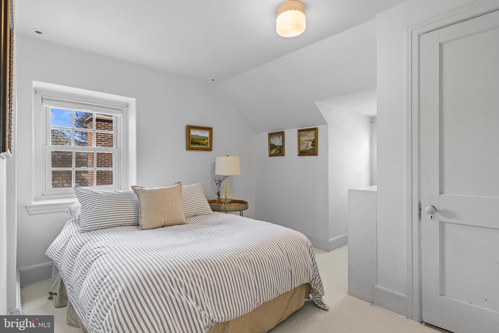 510 Anthwyn Road Merion Station, PA 19066 - Photo 22 of 30 a bedroom with a bed and a window