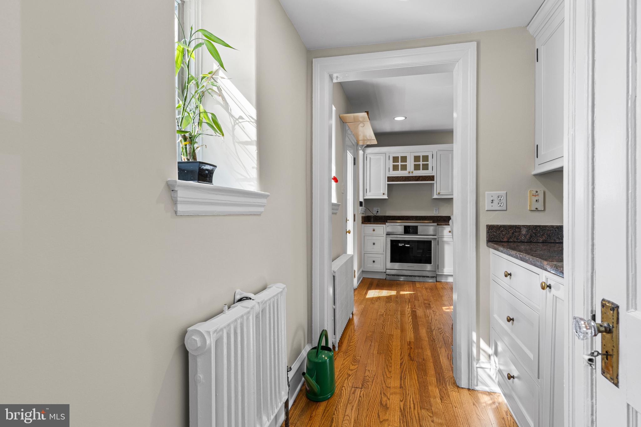 510 Anthwyn Road Merion Station, PA 19066 - Photo 10 of 30 a view of a hallway view with wooden floor and living room