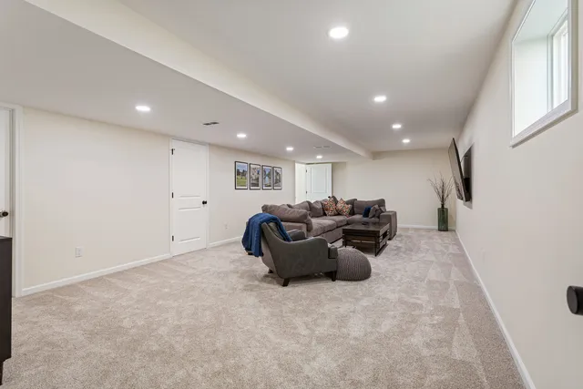 a living room with furniture and a couch