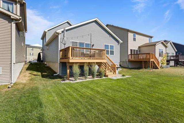a view of a swimming pool with a couches in a patio