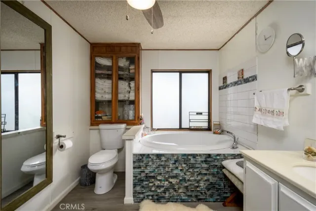 a bathroom with a sink and a large mirror