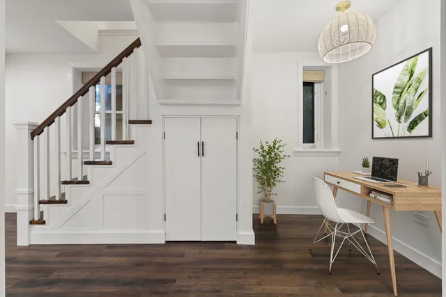 a view of entryway with wooden floor