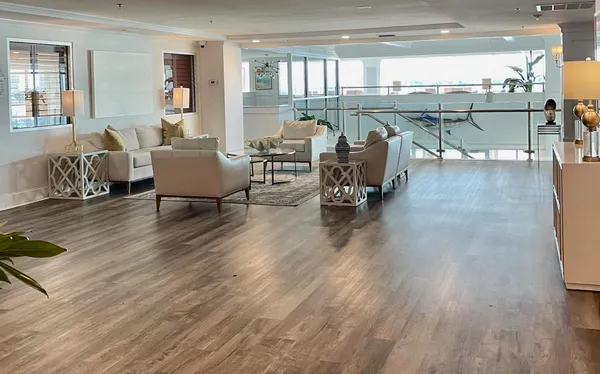 a living room with furniture and a table