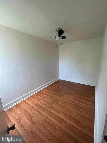 a view of small space with wooden floor