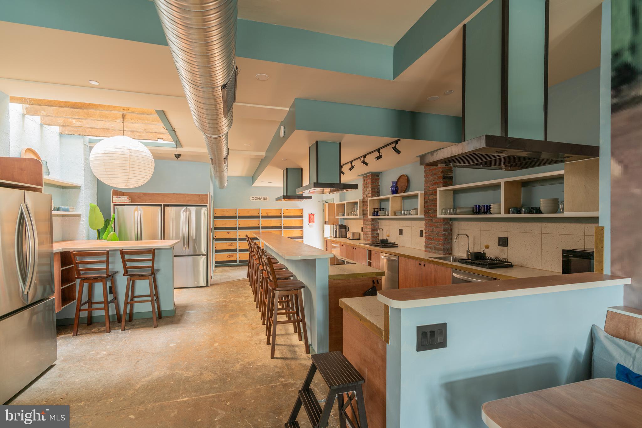 711 G Street Southeast Washington, DC 20003 - Photo 16 of 55 a dining room with furniture and a kitchen area