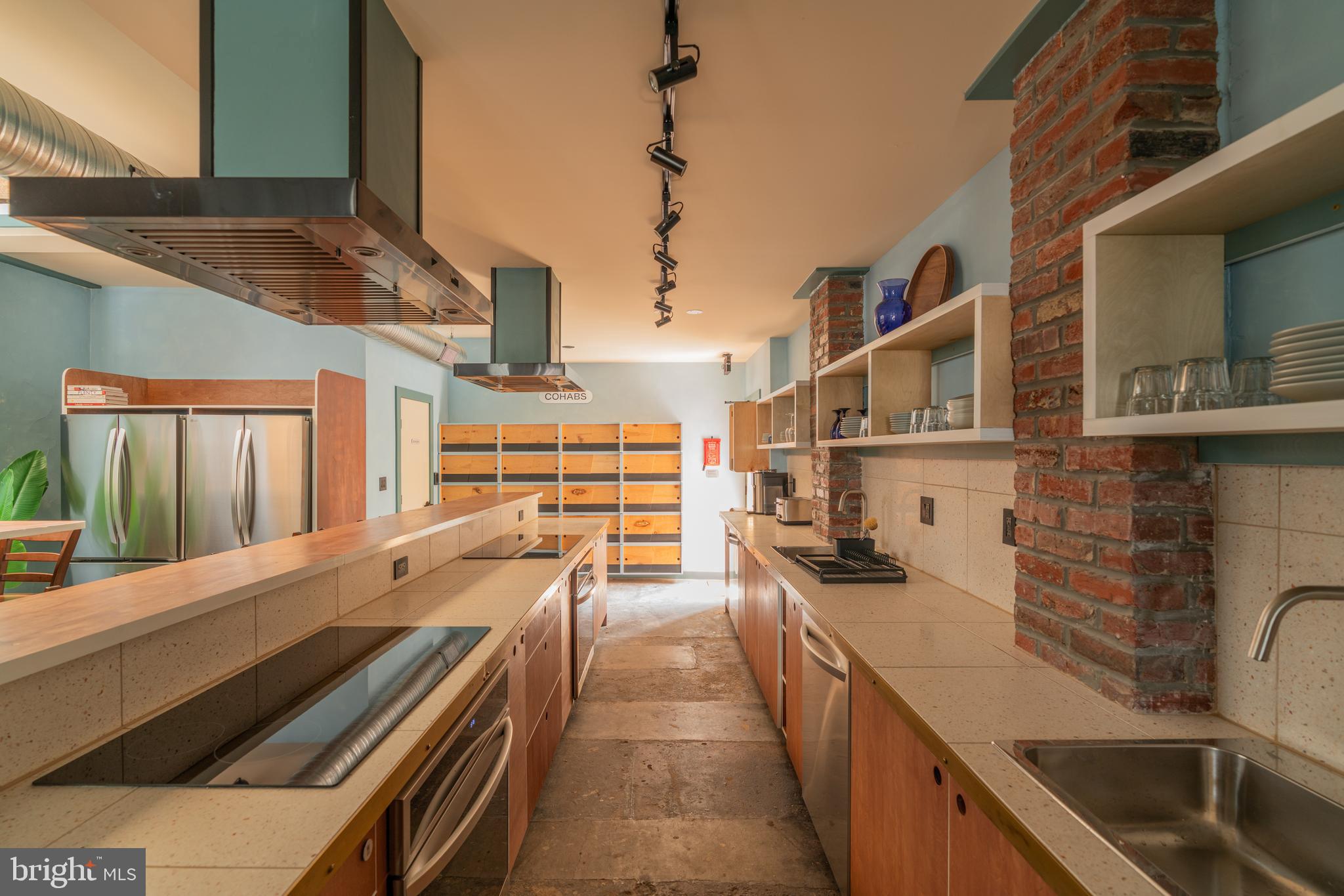 711 G Street Southeast Washington, DC 20003 - Photo 22 of 55 a kitchen with lots of counter top space
