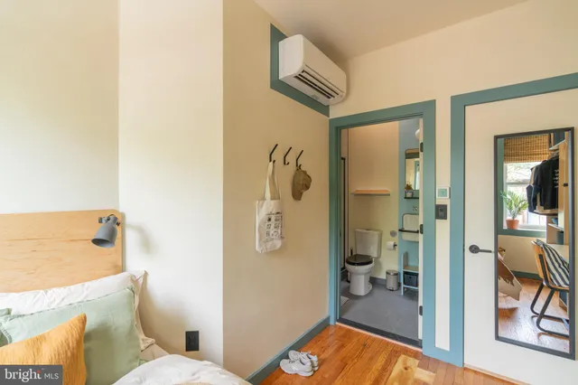 a bathroom with a shower and a sink