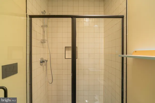 a bathroom with a bathtub and a sink